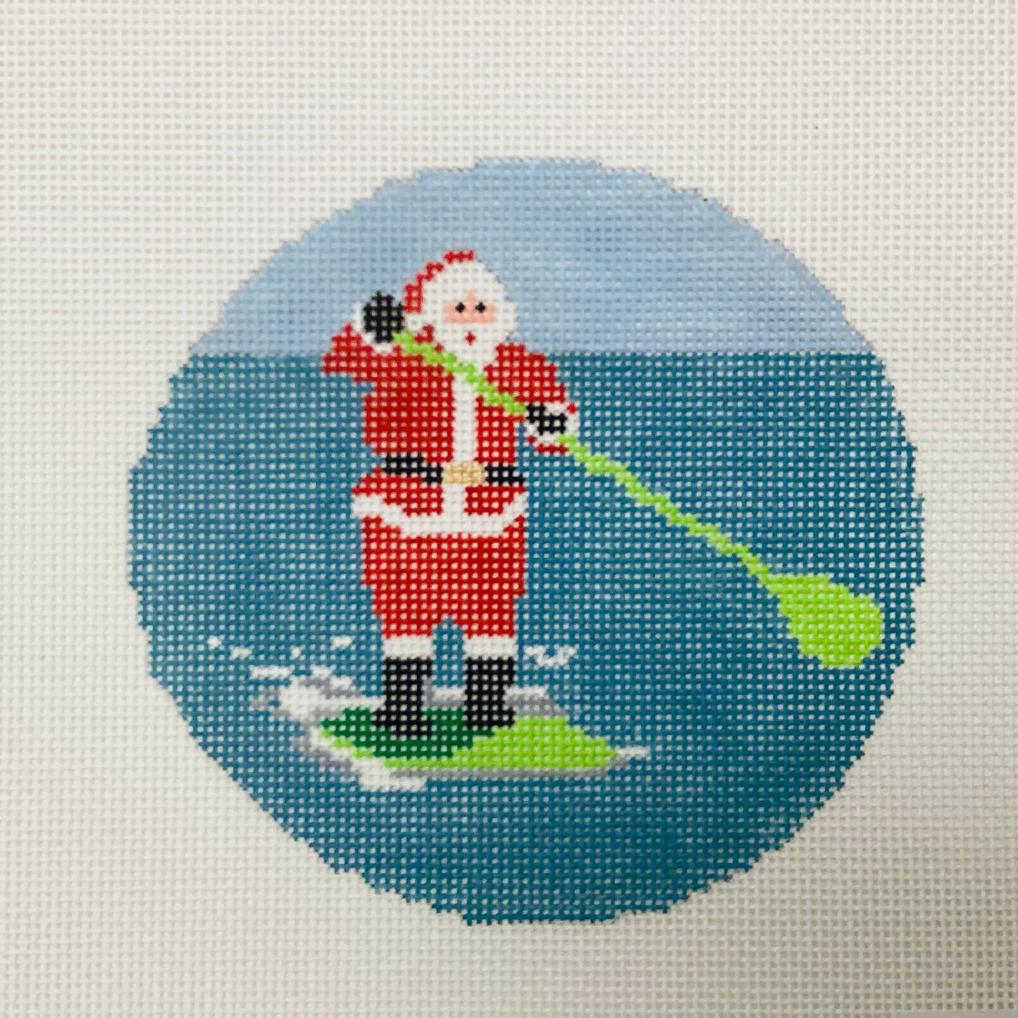 Sporty Santa - Paddleboarding